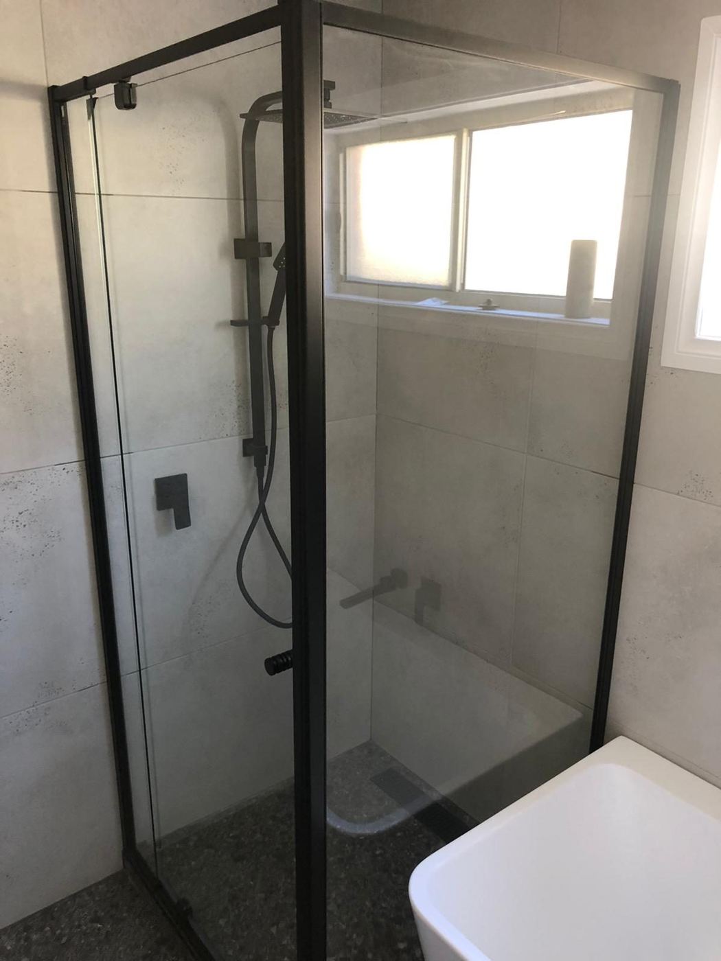 Black semi-frameless shower