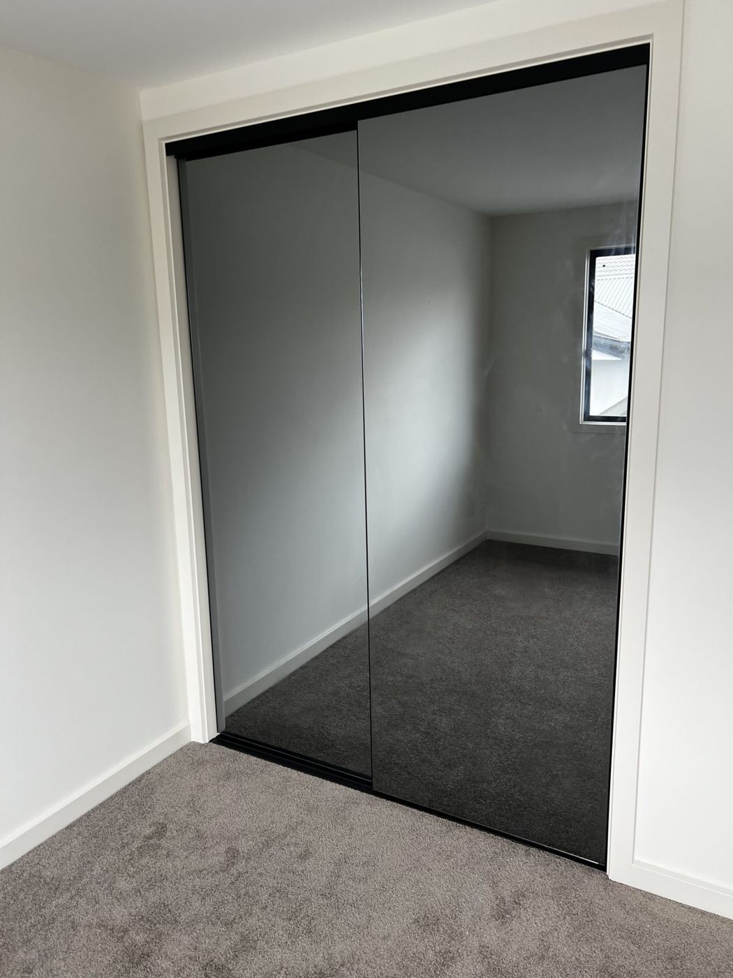 Mirrored sliding wardrobe doors